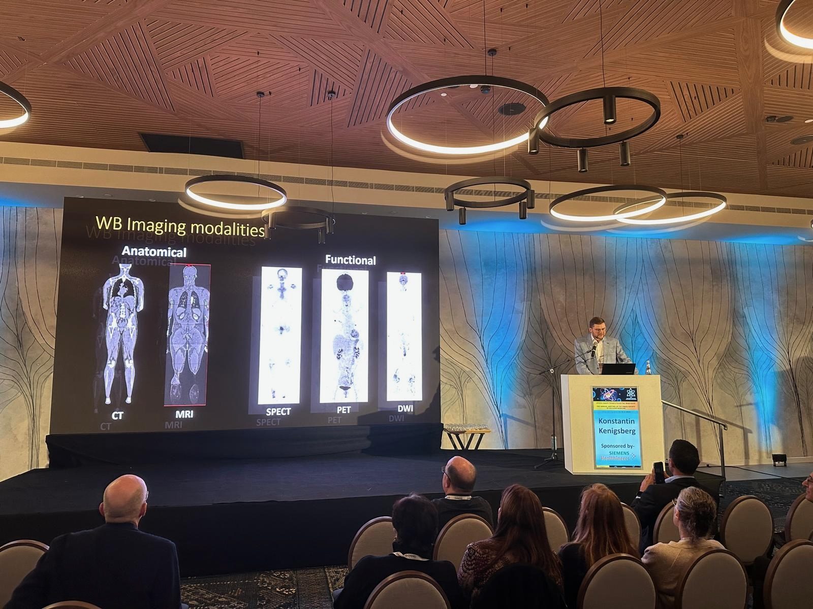 Dr Konstantin Kenigsberg giving an invited hybrid-imaging lecture at the 2025 Israeli Society of Nuclear Medicine conference